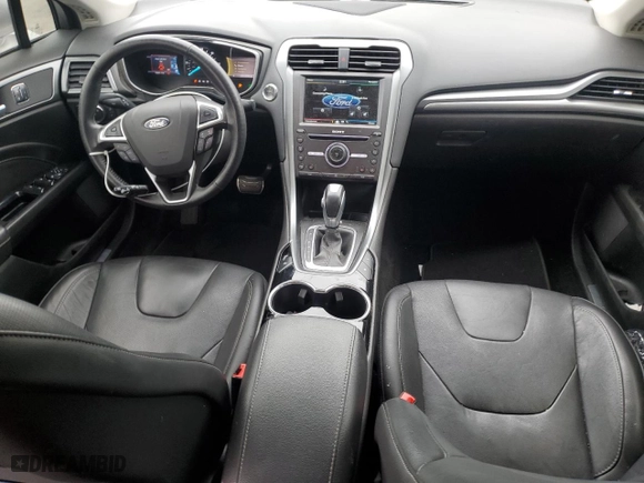 2016 Ford Fusion Energi Titanium with VIN 3FA6P0SUXGR320562, listed as a Copart auction lot 52647485 with 73,931 mi miles and Salvage Title. Bid and sale history available at carsss.com. Image 8.