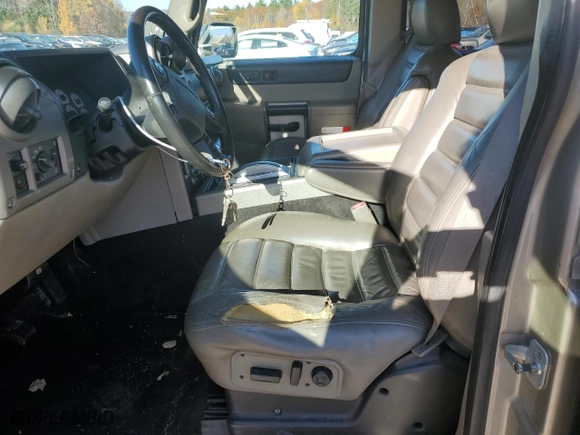 2003 Hummer H2 with VIN 5GRGN23U23H138301, listed as a Copart auction lot 77449044 with 172,174 mi miles and Salvage Title. Bid and sale history available at carsss.com. Image 7.