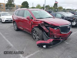 2020 Cadillac XT6 FWD Premium Luxury with VIN 1GYKPCRSXLZ133207, listed as a IAAI auction lot 41733269 with 82,853 mi miles. Bid and sale history available at carsss.com. Image 1.