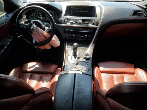 2015 BMW 6 Series z VIN WBALY1C57FDZ73541, wystawiony jako Copart lot #57294034 z przebiegiem 136 357 mil mil oraz Czysty tytuł • Clean title. Historia ofert i sprzedaży dostępna na DreamBid. Obrazek 8.