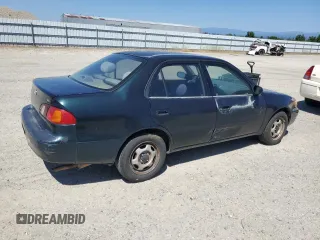 1999 Toyota Corolla VE с VIN 1NXBR12E4XZ240034, выставлен на аукционе Copart как лот 55860355 с пробегом 252 442 миль миль и Списание • Salvage title. История ставок и продаж доступна на DreamBid. Изображение 3.