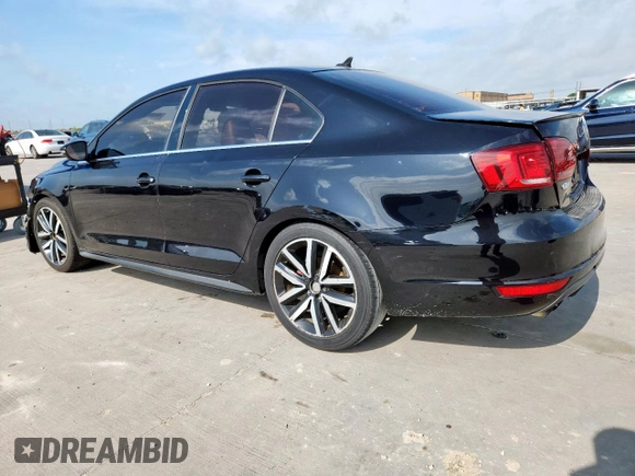 2014 Volkswagen Jetta GLI Edition 30 z VIN 3VW4S7AJ1EM390796, wystawiony jako Copart lot #61292085 z przebiegiem 138 224 mil mil oraz Czysty tytuł • Clean title. Historia ofert i sprzedaży dostępna na DreamBid. Obrazek 2.