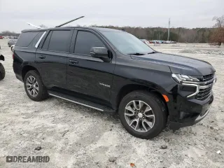 2021 Chevrolet Tahoe LT with VIN 1GNSCNKD6MR130449, listed as a Copart auction lot 83412174 with 60,598 mi miles and Salvage Title. Bid and sale history available at carsss.com. Image 4.