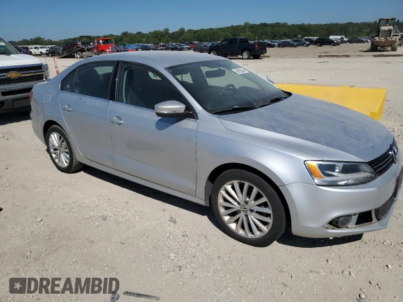 2011 Volkswagen Jetta SEL with VIN 3VWLZ7AJXBM056107, listed as a Copart auction lot 69955534 with 104,451 mi miles and Salvage title. Bid and sale history available at DreamBid. Image 4.