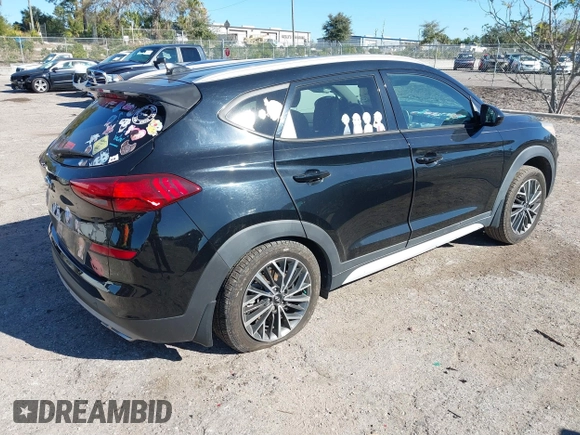 2019 Hyundai Tucson Sport with VIN KM8J33AL5KU902933, listed as a IAAI auction lot 41286316 with 73,799 mi miles. Bid and sale history available at carsss.com. Image 4.