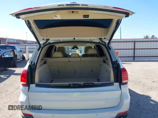 2014 BMW X5 sDrive35i with VIN 5UXKR2C53E0C01692, listed as a IAAI auction lot 41727216 with 135,985 mi miles. Bid and sale history available at carsss.com. Image 17.