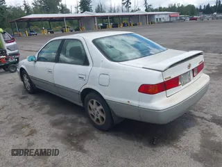 2001 Toyota Camry LE z VIN JT2BF22K310304712, wystawiony jako IAAI lot #42386743 z przebiegiem 103 552 mil mil oraz . Historia ofert i sprzedaży dostępna na DreamBid. Obrazek 3.