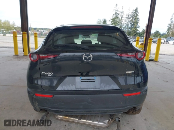 2024 Mazda CX-30 2.5 S with VIN 3MVDMBAM5RM633007, listed as a IAAI auction lot 42014511 with 11,895 mi miles. Bid and sale history available at carsss.com. Image 16.