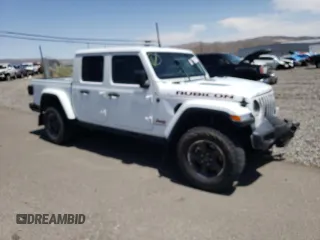 2022 Jeep Gladiator Rubicon z VIN 1C6JJTBG4NL135430, wystawiony jako Copart lot #52581015 z przebiegiem 54 553 mil mil oraz Szkoda całkowita • Salvage title. Historia ofert i sprzedaży dostępna na DreamBid. Obrazek 4.