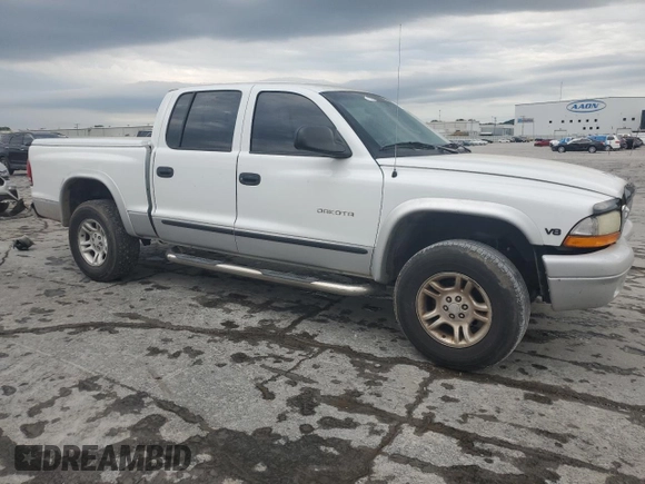 2002 Dodge Dakota SLT z VIN 1B7HG48N22S614075, wystawiony jako Copart lot #57783905 z przebiegiem 247 769 mil mil oraz Szkoda całkowita • Salvage title. Historia ofert i sprzedaży dostępna na DreamBid. Obrazek 4.