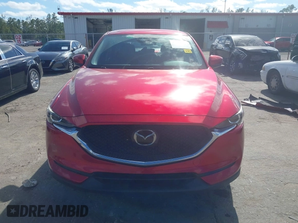 2020 Mazda CX-5 Sport with VIN JM3KFABM7L1819493, listed as a IAAI auction lot 41304240 with 52,940 mi miles. Bid and sale history available at carsss.com. Image 12.