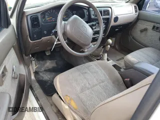 1999 Toyota Tacoma with VIN 4TAPM62N8XZ457624, listed as a Copart auction lot 71565904 with 133,851 mi miles and Salvage Title. Bid and sale history available at DreamBid. Image 8.