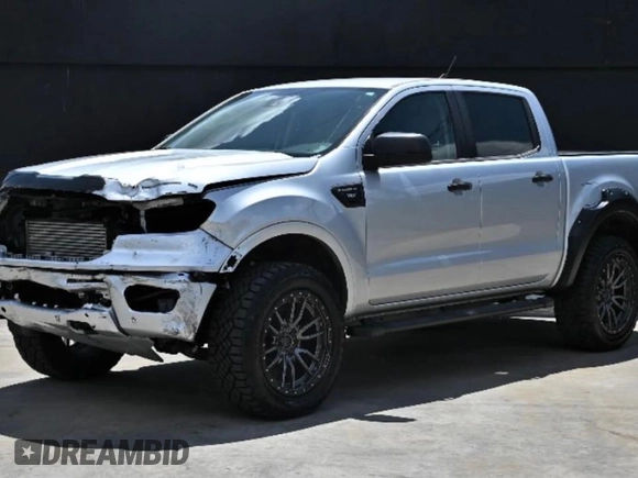 2019 Ford Ranger XL with VIN 1FTER4FH5KLA29401, listed as a Copart auction lot 64990365 with 98,143 mi miles and Salvage title. Bid and sale history available at DreamBid. Image 2.
