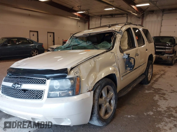 2009 Chevrolet Tahoe LTZ z VIN 1GNFK33049R213387, wystawiony jako IAAI lot #42011796 z przebiegiem Nie podano mil oraz . Historia ofert i sprzedaży dostępna na DreamBid. Obrazek 6.