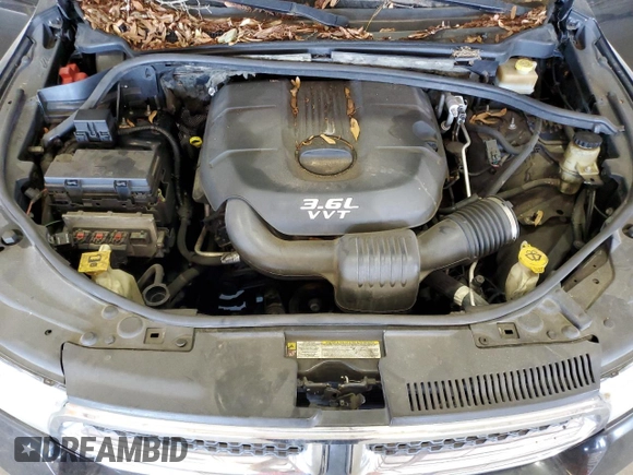 2013 Dodge Durango Crew with VIN 1C4RDHDG5DC617402, listed as a Copart auction lot 58056795 with 180,990 mi miles and Salvage title. Bid and sale history available at DreamBid. Image 12.