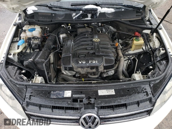 2011 Volkswagen Touareg Sport with VIN WVGFF9BP8BD002982, listed as a Copart auction lot 53958555 with 156,742 mi miles and Salvage Title. Bid and sale history available at DreamBid. Image 12.