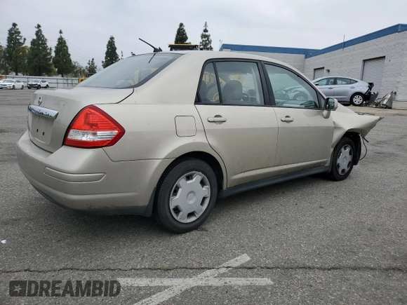 2009 Nissan Versa S with VIN 3N1BC11E79L433933, listed as a Copart auction lot 54953675 with 196,785 mi miles and Salvage Title. Bid and sale history available at DreamBid. Image 3.
