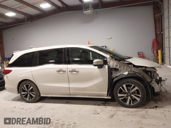 2018 Honda Odyssey Elite with VIN 5FNRL6H94JB034739, listed as a IAAI auction lot 41242506 with 96,982 mi miles and . Bid and sale history available at DreamBid. Image 14.