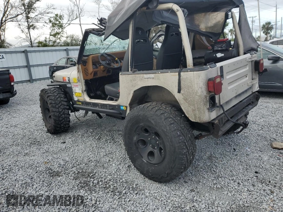 1995 Jeep Wrangler S with VIN 1J4FY19P9SP316266, listed as a Copart auction lot 88686725 with 121,561 mi miles and Salvage Title. Bid and sale history available at carsss.com. Image 2.