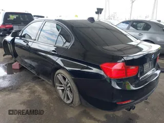 2014 BMW 3 Series 328i with VIN WBA3C1G53ENR49917, listed as a IAAI auction lot 42116704 with 148,630 mi miles and . Bid and sale history available at carsss.com. Image 3.