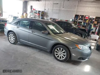2013 Chrysler 200 Touring with VIN 1C3CCBBB8DN612619, listed as a IAAI auction lot 41769968 with 155,387 mi miles. Bid and sale history available at carsss.com. Image 1.