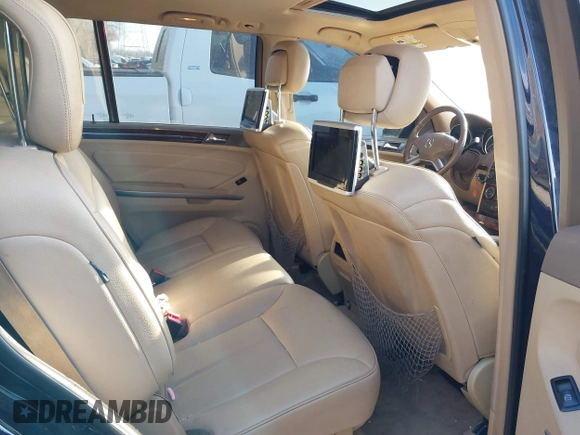 2012 Mercedes-Benz GL 450 z VIN 4JGBF7BE1CA797006, wystawiony jako IAAI lot #41781665 z przebiegiem 150 600 mil mil oraz . Historia ofert i sprzedaży dostępna na DreamBid. Obrazek 8.