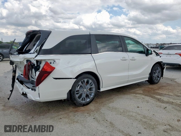 2025 Honda Odyssey Touring with VIN 5FNRL6H88SB001428, listed as a Copart auction lot 53836615 with 14,580 mi miles and Salvage title. Bid and sale history available at DreamBid. Image 3.