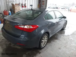 2014 Kia Forte LX with VIN KNAFX4A69E5237321, listed as a IAAI auction lot 41534280 with 100,810 mi miles. Bid and sale history available at carsss.com. Image 4.