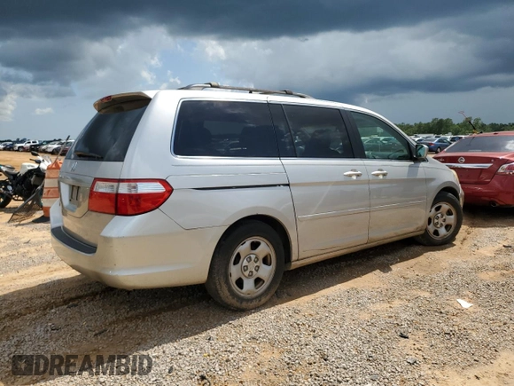 2006 Honda Odyssey EX-L z VIN 5FNRL387X6B458818, wystawiony jako Copart lot #61801335 z przebiegiem 227 179 mil mil oraz Czysty tytuł • Clean title. Historia ofert i sprzedaży dostępna na DreamBid. Obrazek 3.