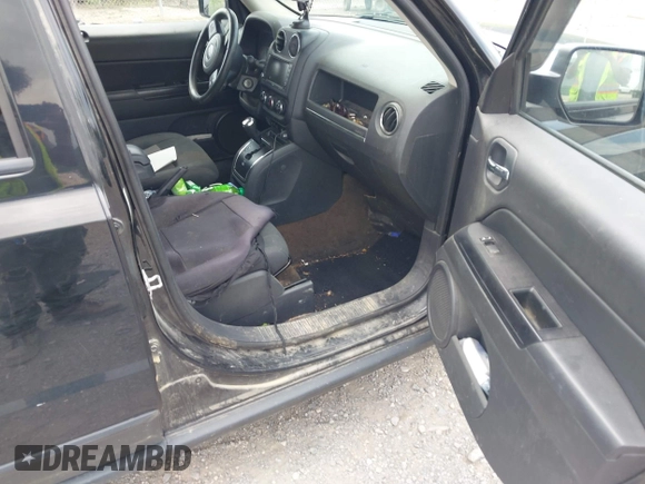 2014 Jeep Patriot Latitude with VIN 1C4NJRFB0ED892203, listed as a IAAI auction lot 42617739 with 100,607 mi miles and . Bid and sale history available at DreamBid. Image 5.