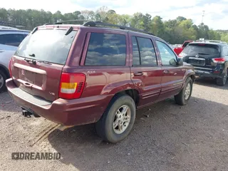 1999 Jeep Grand Cherokee Limited with VIN 1J4GW68N8XC595697, listed as a IAAI auction lot 41917466 with 177,944 mi miles. Bid and sale history available at carsss.com. Image 4.