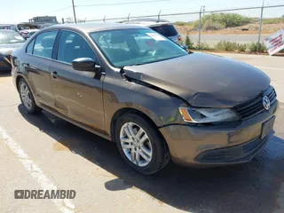 2014 Volkswagen Jetta S with VIN 3VW2K7AJ8EM319182, listed as a IAAI auction lot 42180101 with 133,495 mi miles and . Bid and sale history available at DreamBid. Image 1.