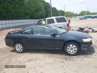 1998 Honda Accord EX z VIN 1HGCG3257WA012427, wystawiony jako IAAI lot #42230192 z przebiegiem 215 230 mil mil oraz . Historia ofert i sprzedaży dostępna na DreamBid. Obrazek 13.