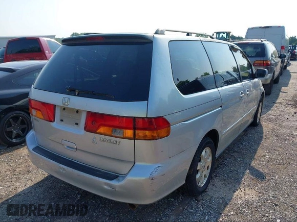 2003 Honda Odyssey EX z VIN 5FNRL18613B111952, wystawiony jako IAAI lot #40852383 z przebiegiem Nie podano mil oraz . Historia ofert i sprzedaży dostępna na DreamBid. Obrazek 4.