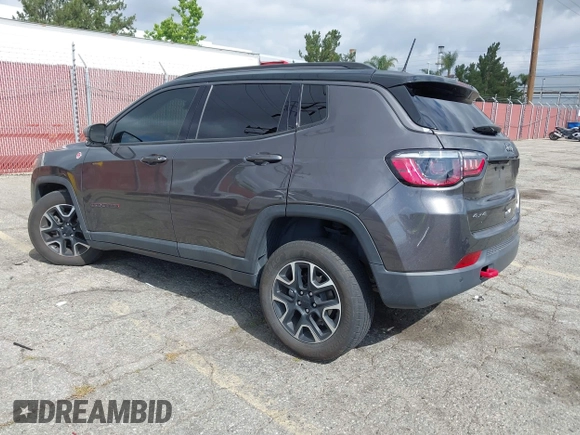 2021 Jeep Compass Trailhawk with VIN 3C4NJDDB6MT561074, listed as a IAAI auction lot 42125886 with 77,293 mi miles and . Bid and sale history available at DreamBid. Image 3.