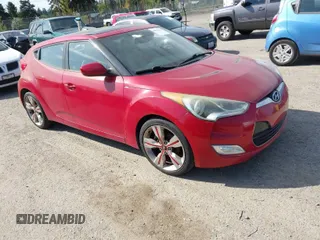 2012 Hyundai Veloster w/Black Int with VIN KMHTC6AD4CU077164, listed as a IAAI auction lot 42053970 with 122,657 mi miles. Bid and sale history available at carsss.com. Image 1.