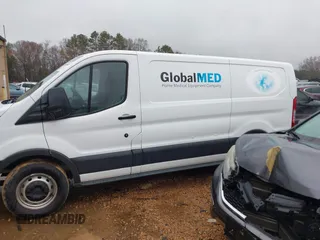 2018 Ford Transit with VIN 1FTYE1YM9JKB54102, listed as a IAAI auction lot 41538430 with 301,078 mi miles and . Bid and sale history available at carsss.com. Image 14.