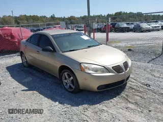 2005 Pontiac G6 with VIN 1G2ZG528754143549, listed as a IAAI auction lot 41726420 with 243,882 mi miles. Bid and sale history available at carsss.com. Image 1.