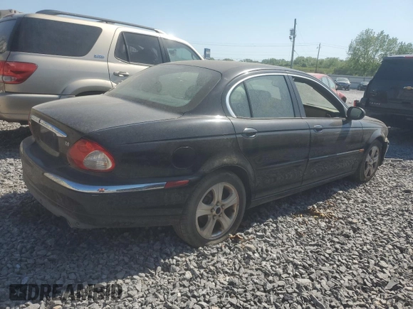 2002 Jaguar X-Type z VIN SAJEA51C02WC53526, wystawiony jako Copart lot #53761265 z przebiegiem 156 584 mil mil oraz Czysty tytuł • Clean title. Historia ofert i sprzedaży dostępna na DreamBid. Obrazek 3.