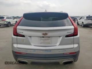 2019 Cadillac XT4 FWD Premium Luxury with VIN 1GYFZCR47KF175802, listed as a Copart auction lot 57153785 with 33,308 mi miles and Salvage title. Bid and sale history available at DreamBid. Image 6.