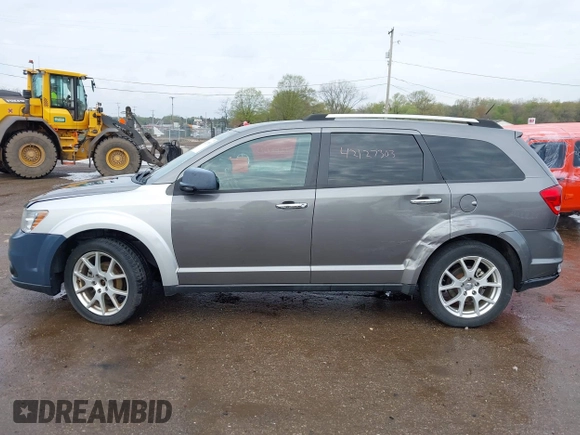 2012 Dodge Journey Crew z VIN 3C4PDCDG9CT146593, wystawiony jako IAAI lot #42127303 z przebiegiem 137 861 mil mil oraz . Historia ofert i sprzedaży dostępna na DreamBid. Obrazek 15.