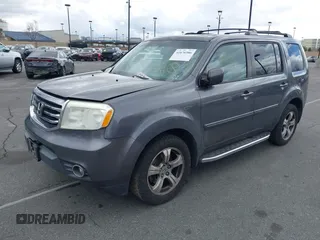 2014 Honda Pilot EX-L with VIN 5FNYF3H52EB015806, listed as a IAAI auction lot 41676586 with 193,215 mi miles and . Bid and sale history available at carsss.com. Image 2.