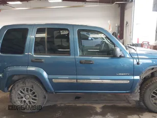 2004 Jeep Liberty Limited with VIN 1J4GK58K84W226666, listed as a IAAI auction lot 41764238 with 148,664 mi miles. Bid and sale history available at carsss.com. Image 13.