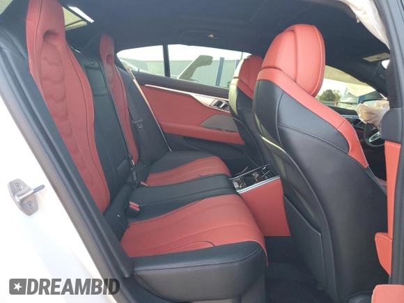 2023 BMW 8 Series M850i z VIN WBAGV8C01PCL31007, wystawiony jako Copart lot #76536874 z przebiegiem Nie podano mil oraz Czysty tytuł • Clean title. Historia ofert i sprzedaży dostępna na DreamBid. Obrazek 10.