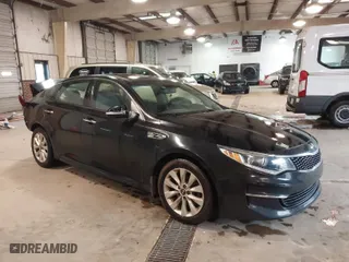 2018 Kia Optima EX with VIN 5XXGU4L30JG182878, listed as a IAAI auction lot 41733244 with 134,642 mi miles. Bid and sale history available at carsss.com. Image 1.