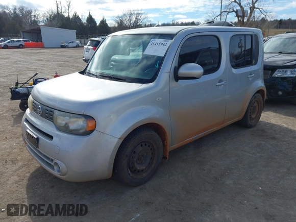 2013 Nissan Cube SL z VIN JN8AZ2KR3DT303767, wystawiony jako IAAI lot #41415942 z przebiegiem 148 218 mil mil oraz . Historia ofert i sprzedaży dostępna na DreamBid. Obrazek 2.