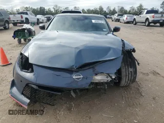 2024 Nissan Z Nismo z VIN JN1BZ4CH0RM360854, wystawiony jako Copart lot #83331374 z przebiegiem 24 237 mil mil oraz Szkoda całkowita • Salvage title. Historia ofert i sprzedaży dostępna na DreamBid. Obrazek 5.