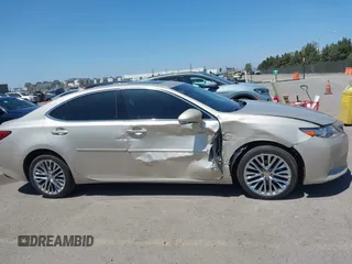 2014 Lexus ES 330 z VIN JTHBK1GG1E2099479, wystawiony jako IAAI lot #42078998 z przebiegiem 85 355 mil mil oraz . Historia ofert i sprzedaży dostępna na DreamBid. Obrazek 13.