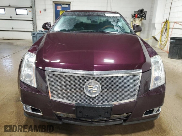 2009 Cadillac CTS AWD z VIN 1G6DT57V990136974, wystawiony jako Copart lot #50154525 z przebiegiem 196 934 mil mil oraz Szkoda całkowita • Salvage title. Historia ofert i sprzedaży dostępna na DreamBid. Obrazek 5.