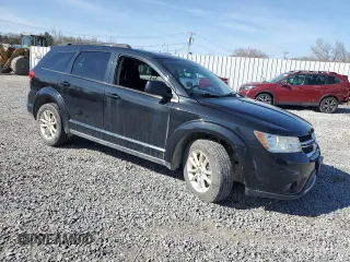 2013 Dodge Journey SXT with VIN 3C4PDDBG3DT572872, listed as a Copart auction lot 54147785 with 147,959 mi miles and Salvage Title. Bid and sale history available at DreamBid. Image 4.
